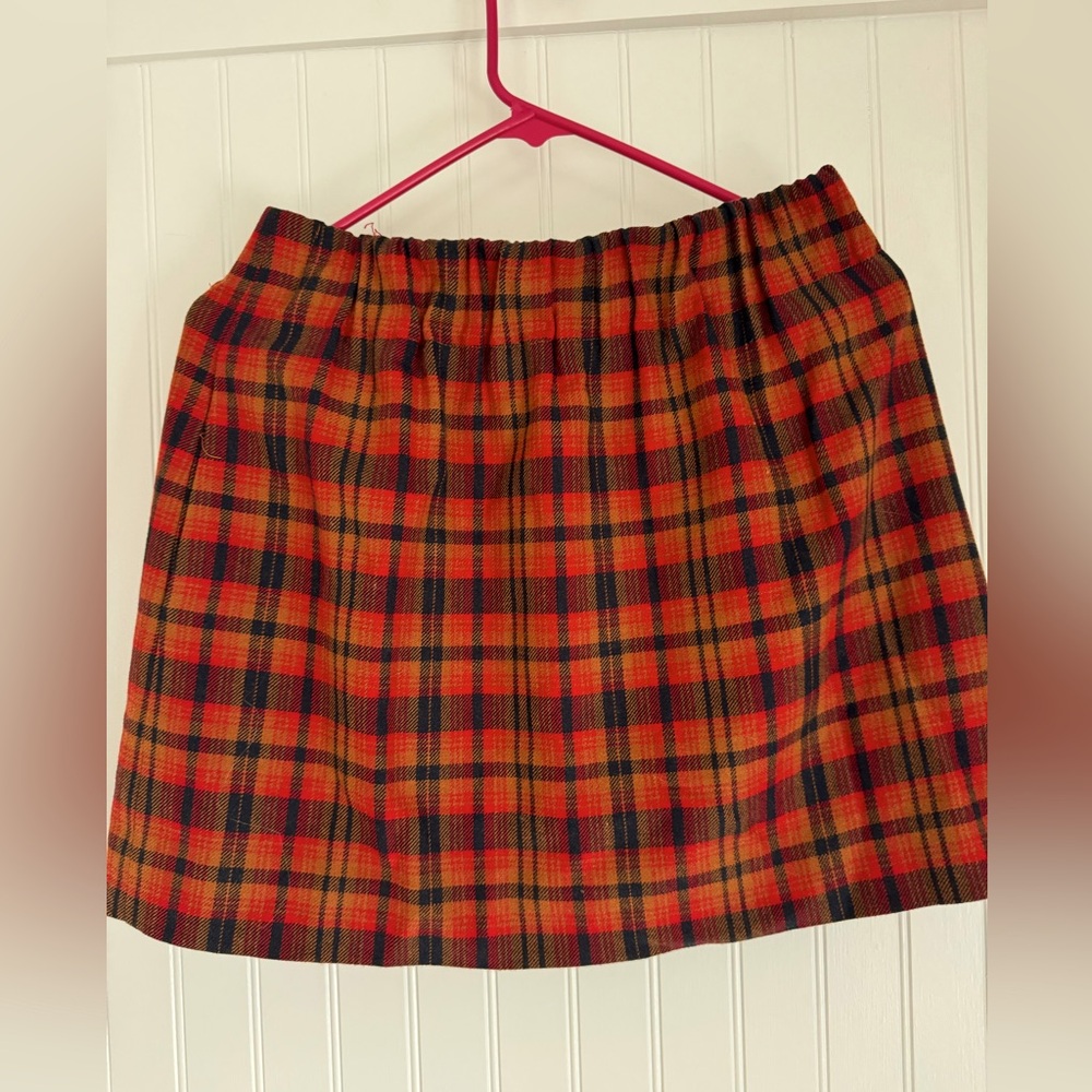J Crew women's size 4 plaid wool skirt. Red, blue, and tan.